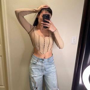 Exposed seam corset top